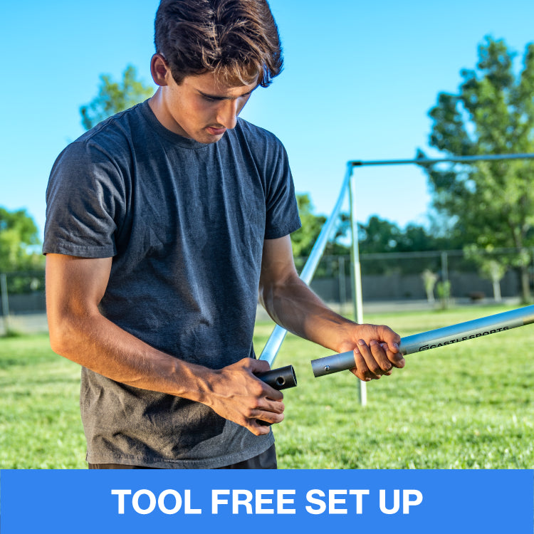 A man setting up a 9 Square set