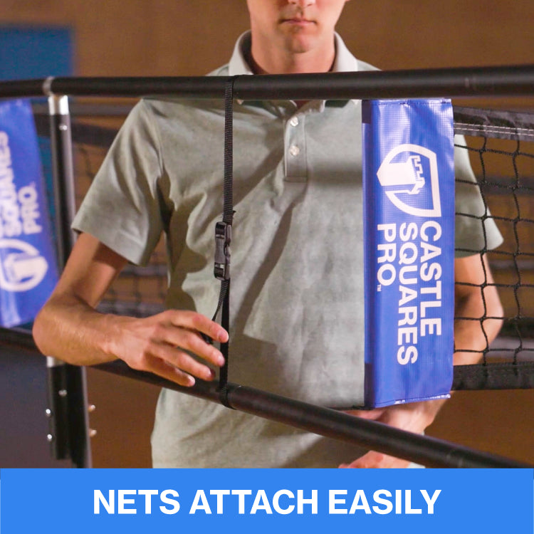 A person adjusting the net of a 9 Square Castle Squares Pro set